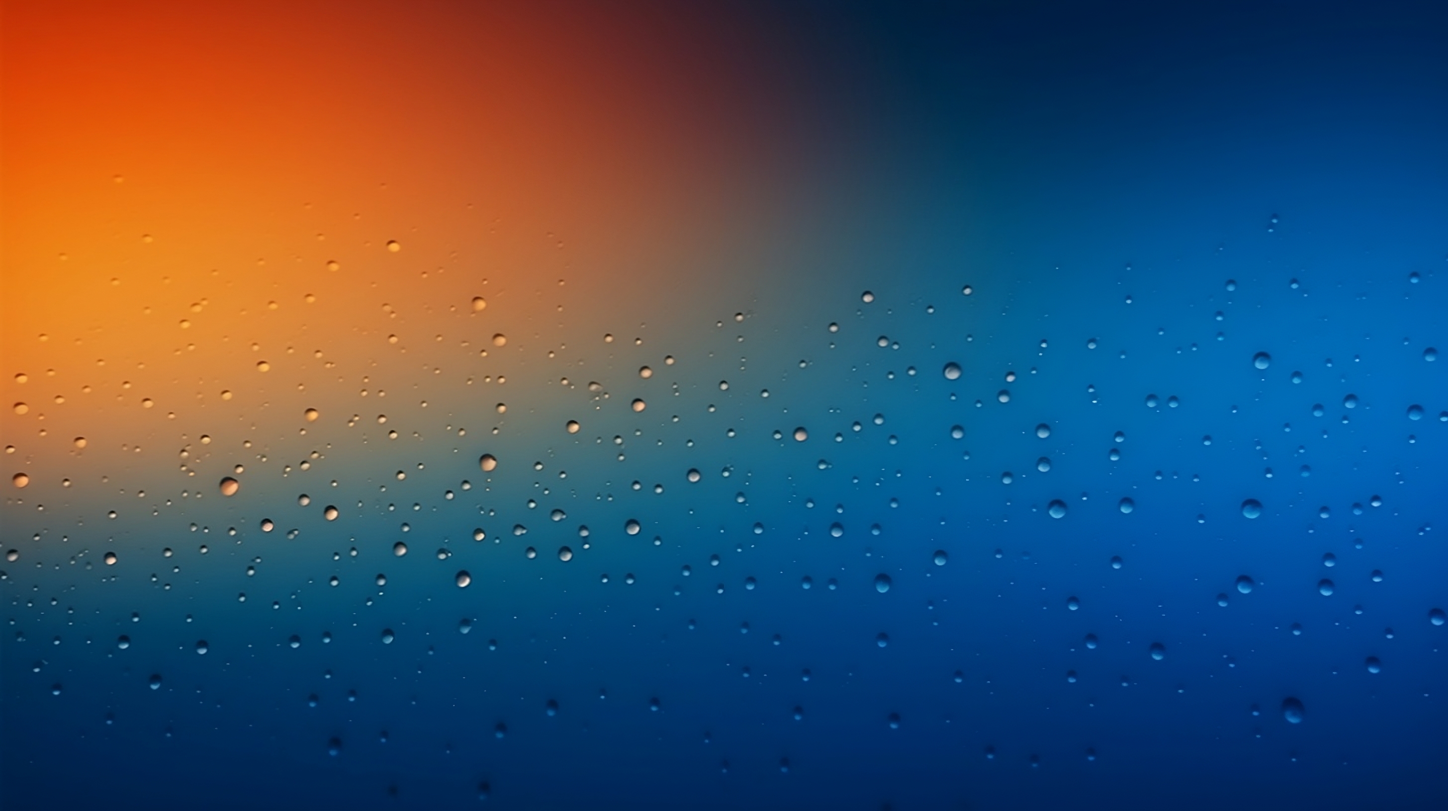 Rain droplets on blue orange gradient background