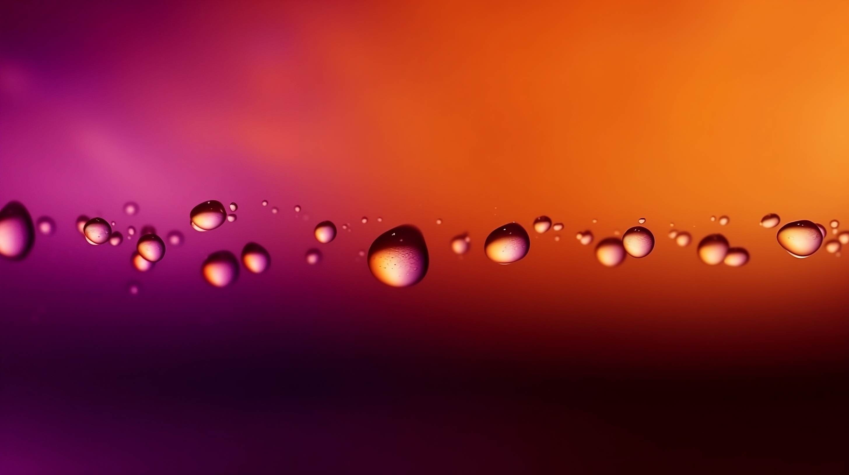 Beautiful rain droplets on purple orange gradient background