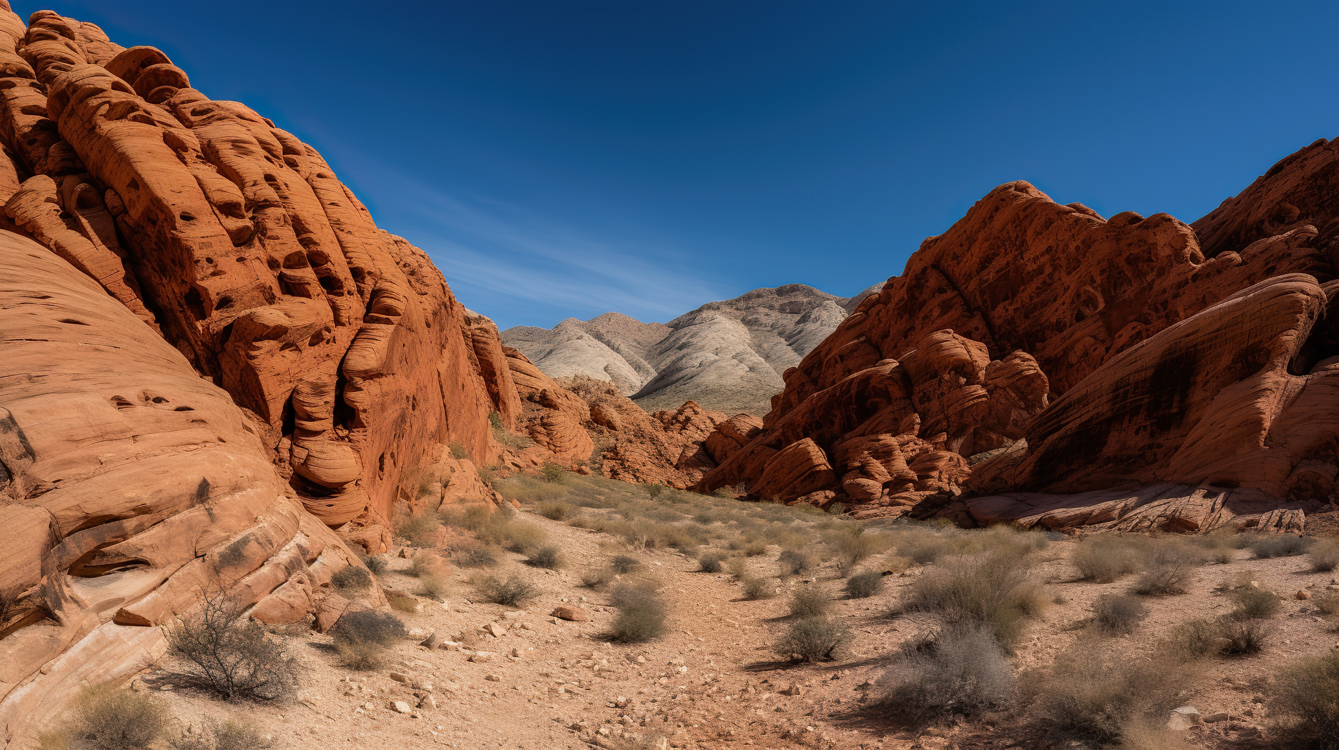 Beautiful red sandstones cliffs, desert view with the blue sky