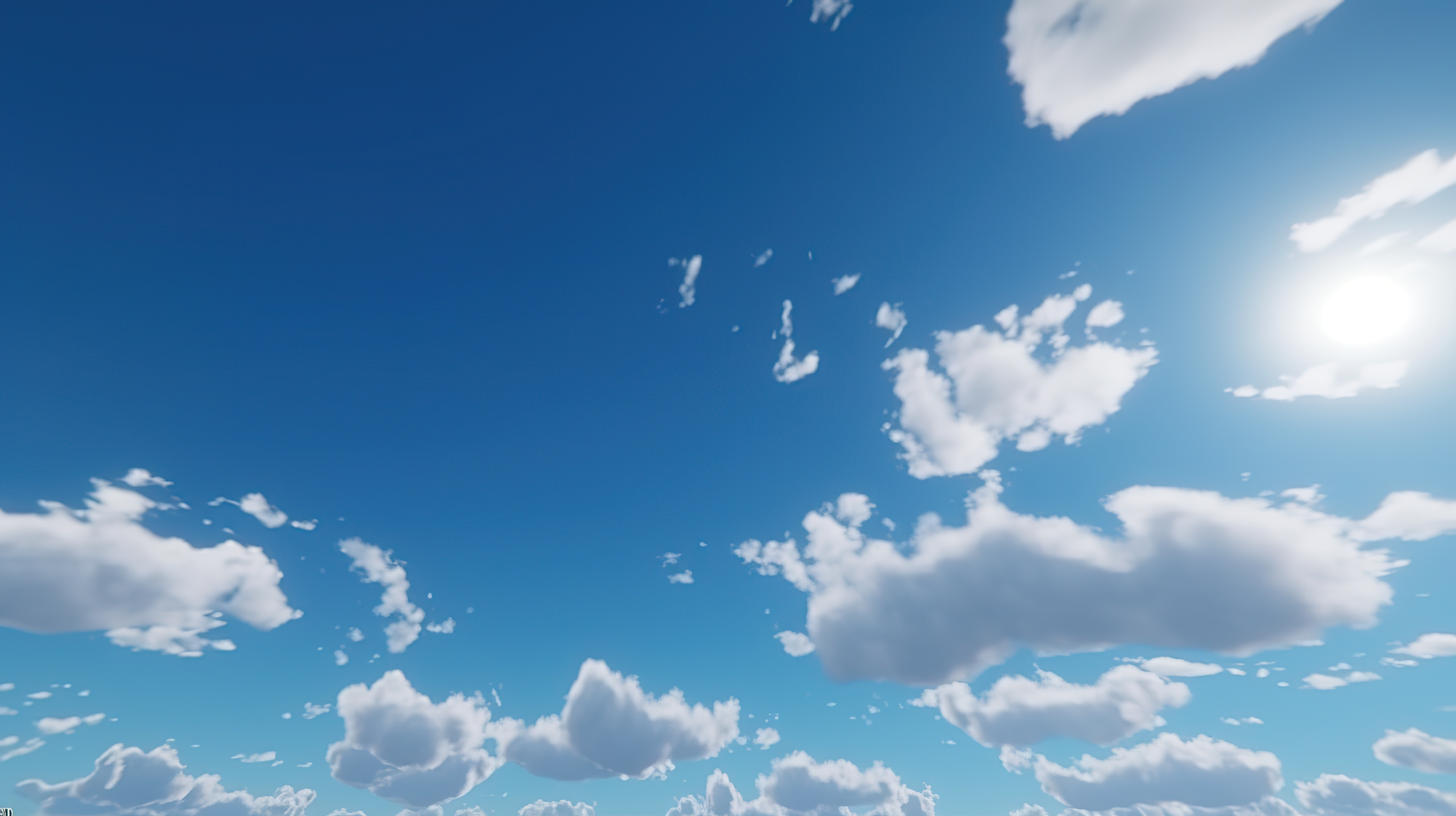 A clear blue sky with fluffy white clouds scattered throughout