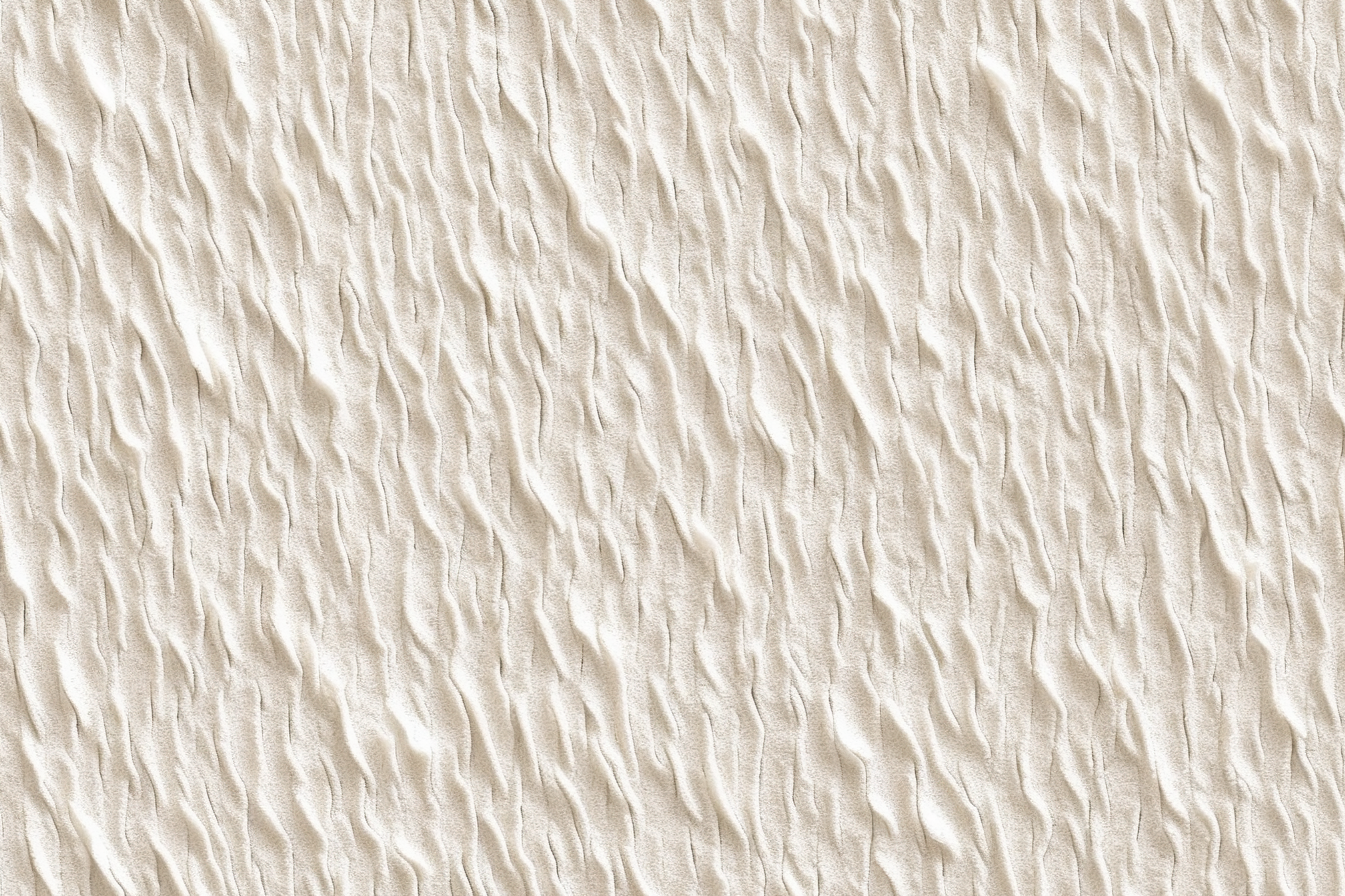 A wall with a rough surface is painted white