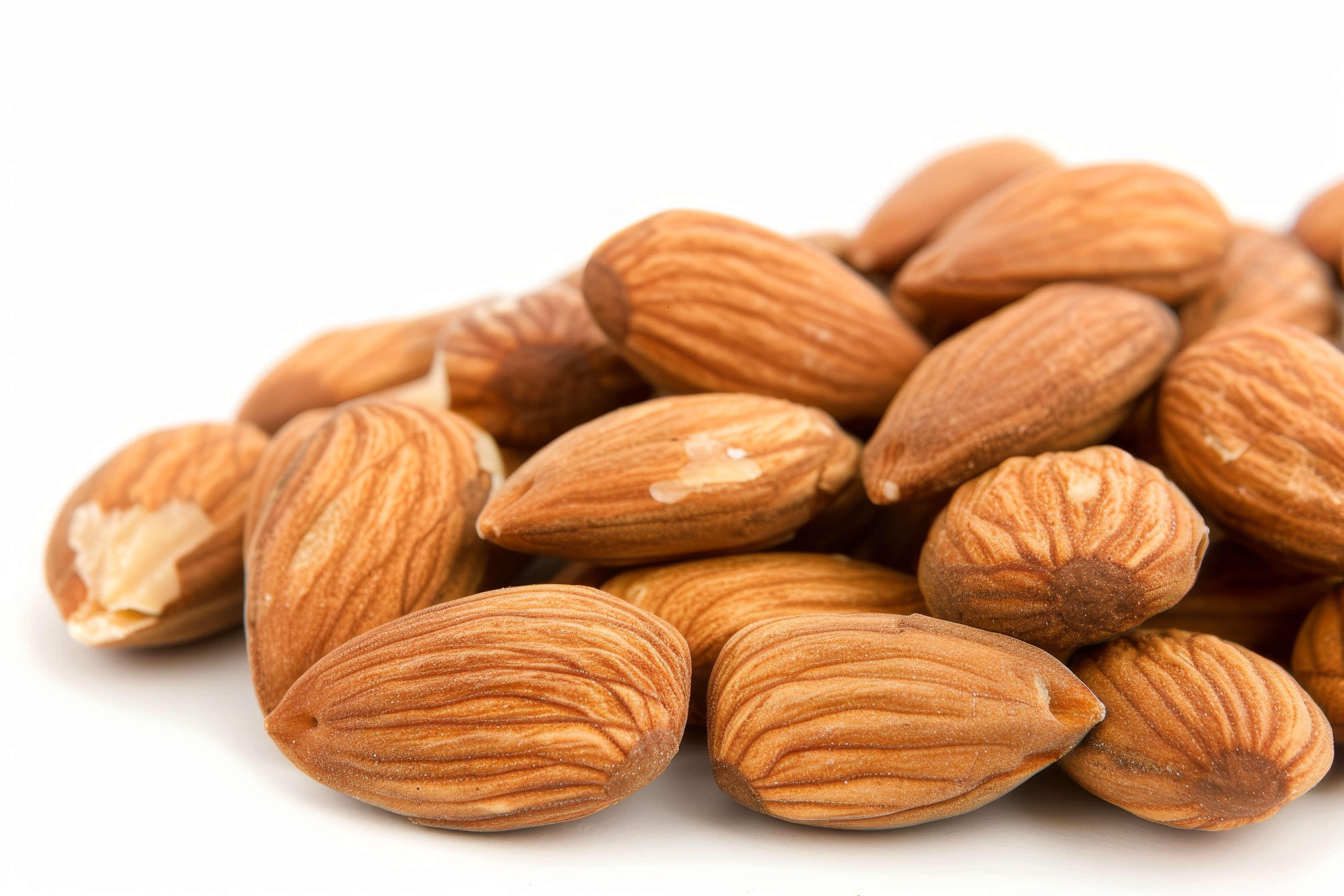 Group of almonds isolated on white Background