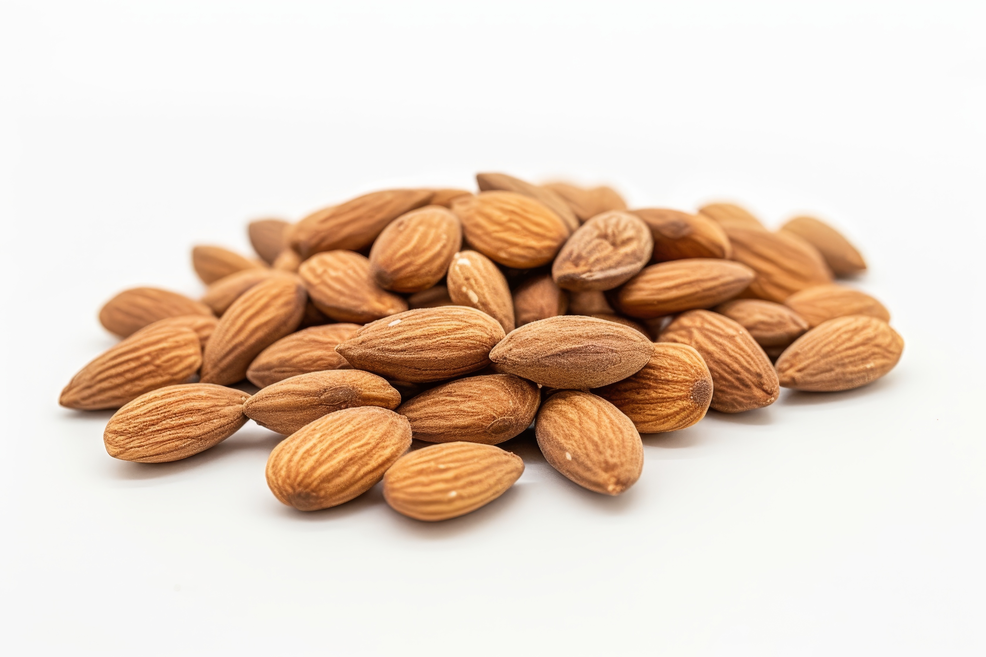 Group of almonds isolated on white Background