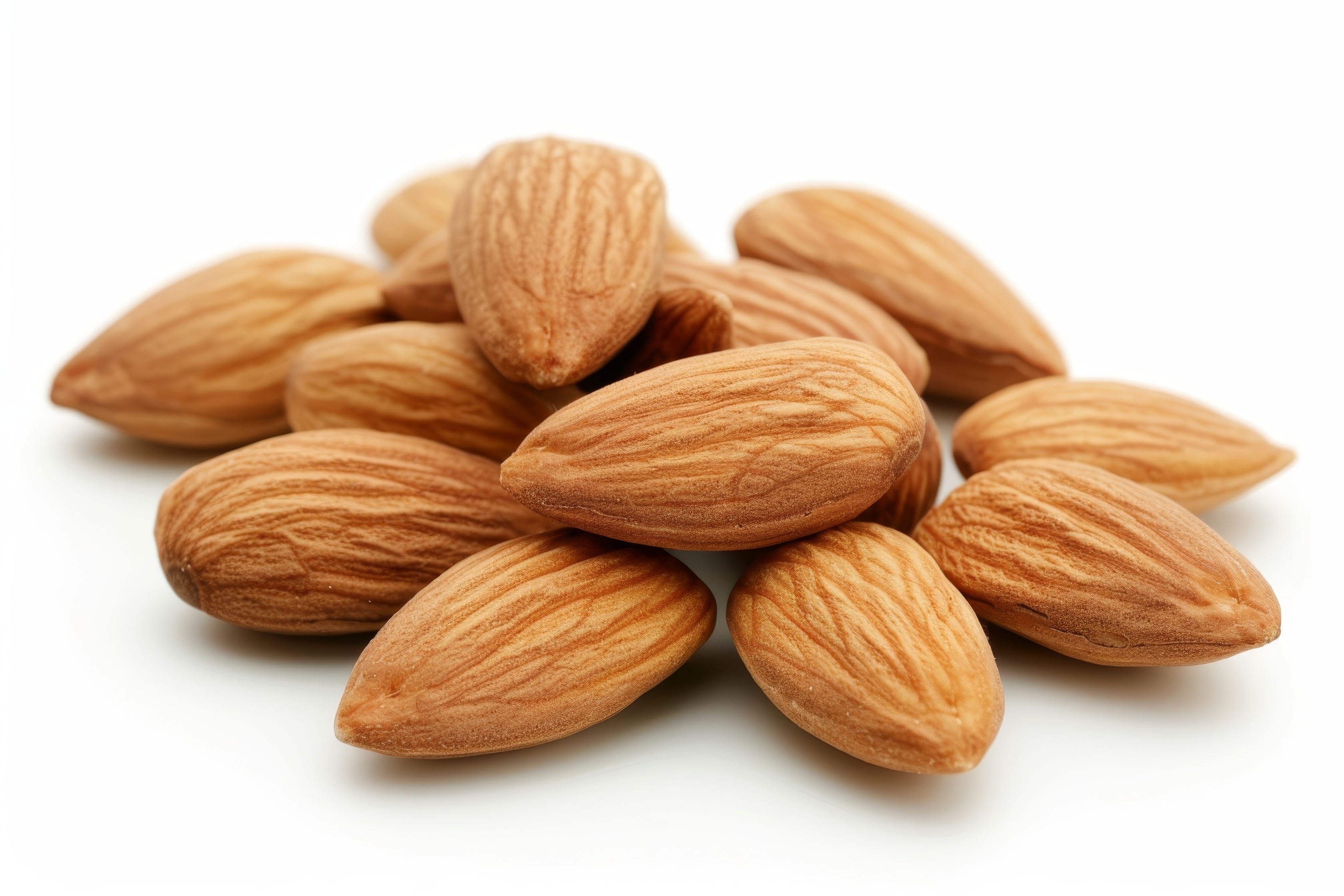 Group of almonds isolated on white Background