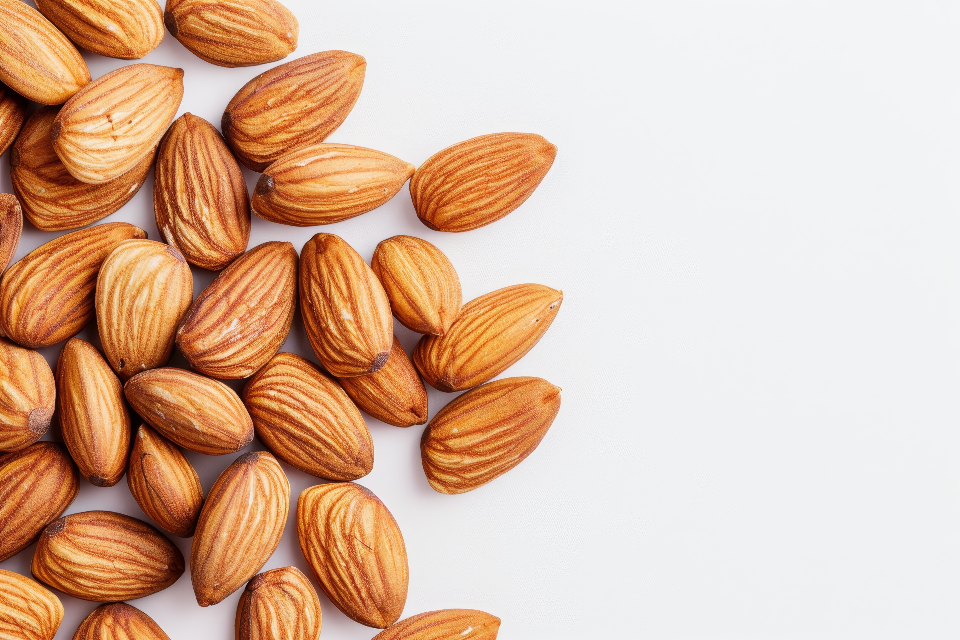 Group of almonds isolated on white Background