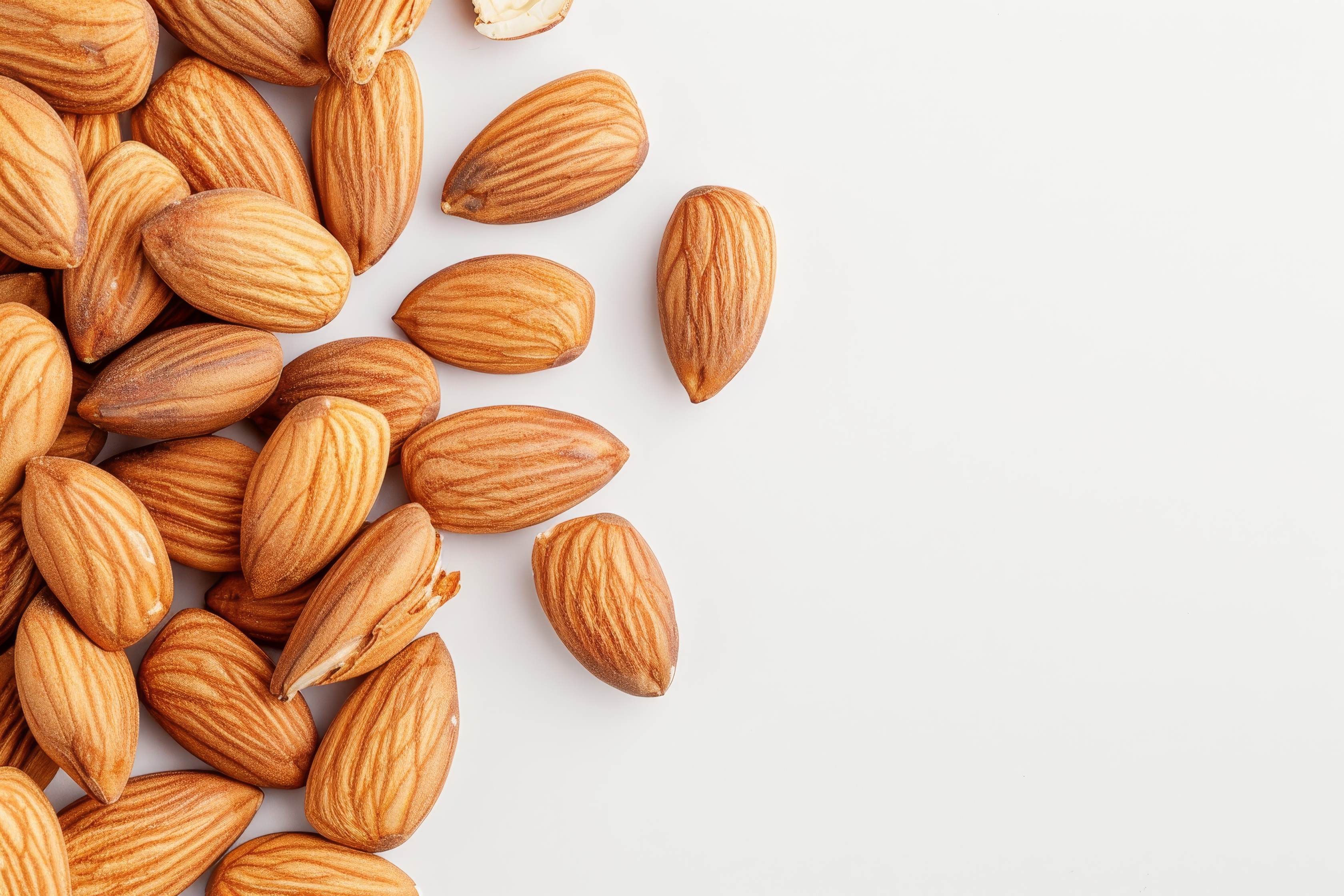 Group of almonds isolated on white Background