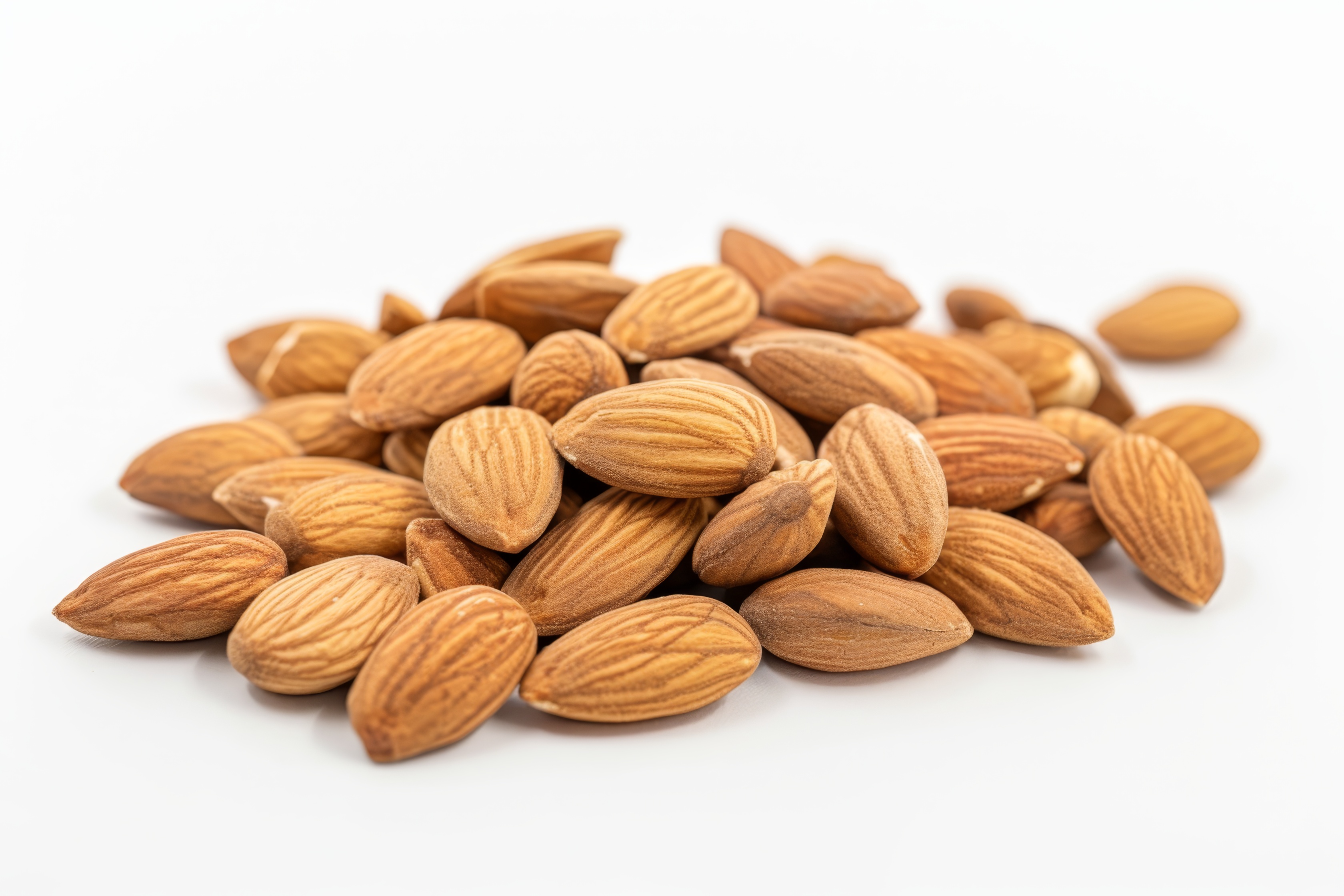 Group of almonds isolated on white Background