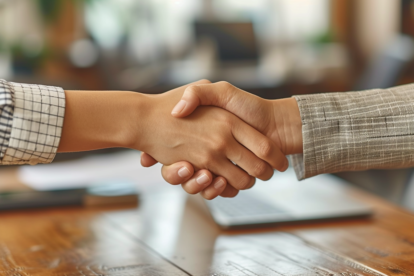 Handshake, Business cooperation at a meeting of business people