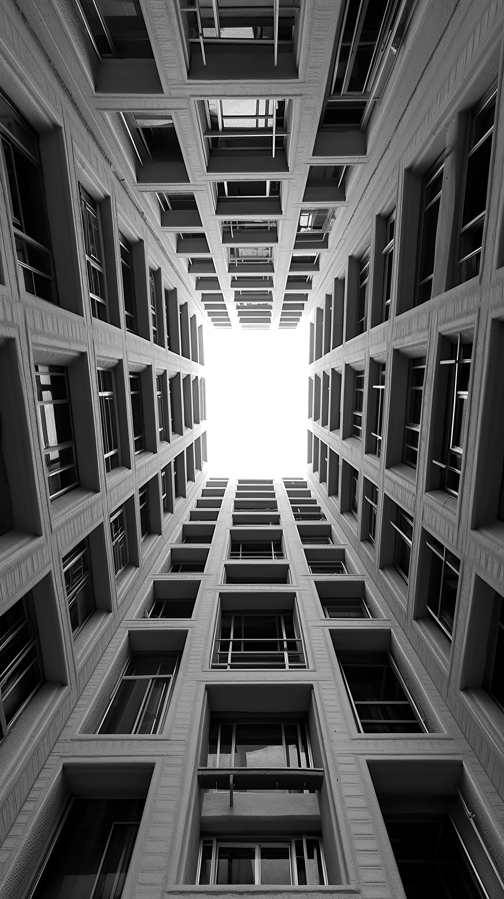Lending lines of windows, low angle photography of buildings