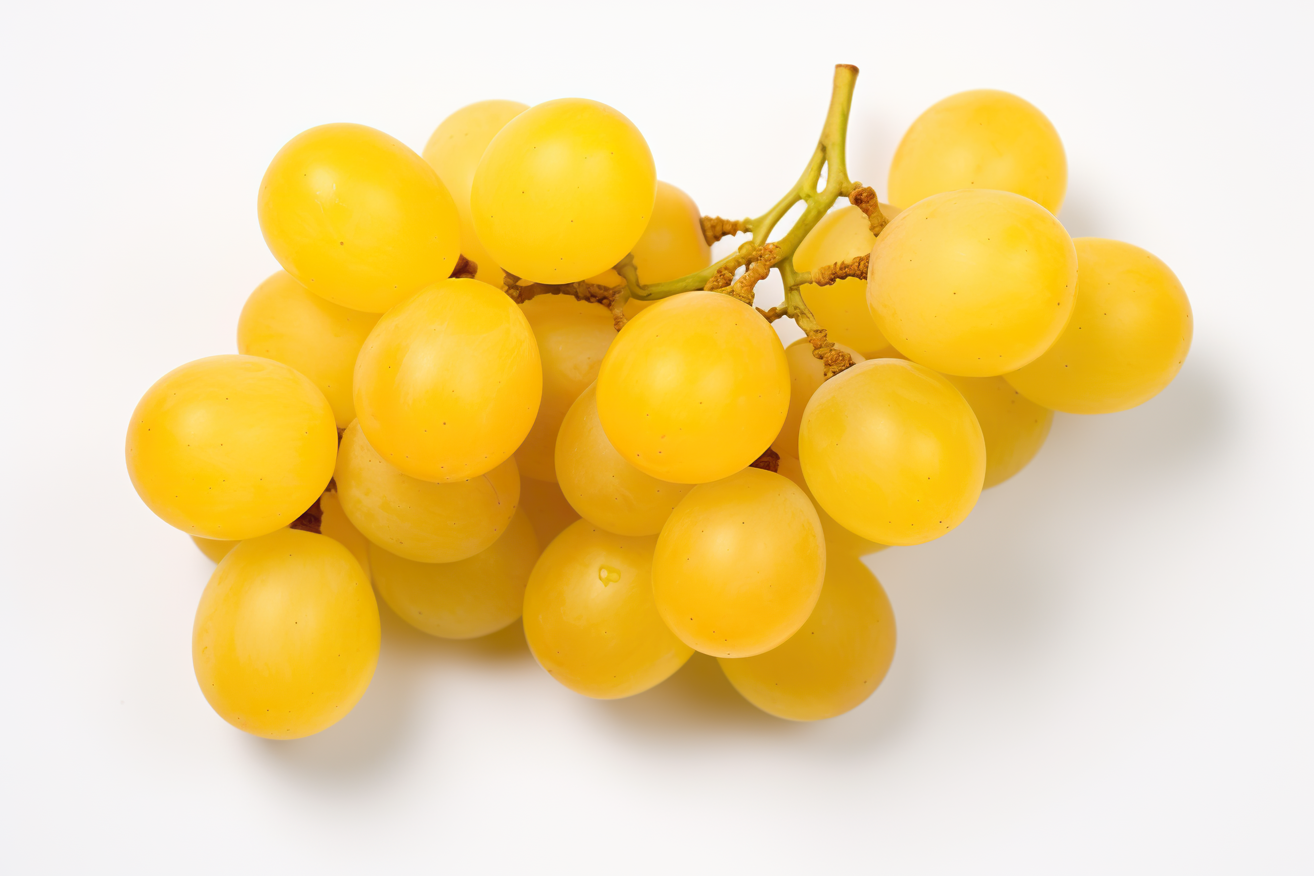 Ripe yellow grapes isolated on white background