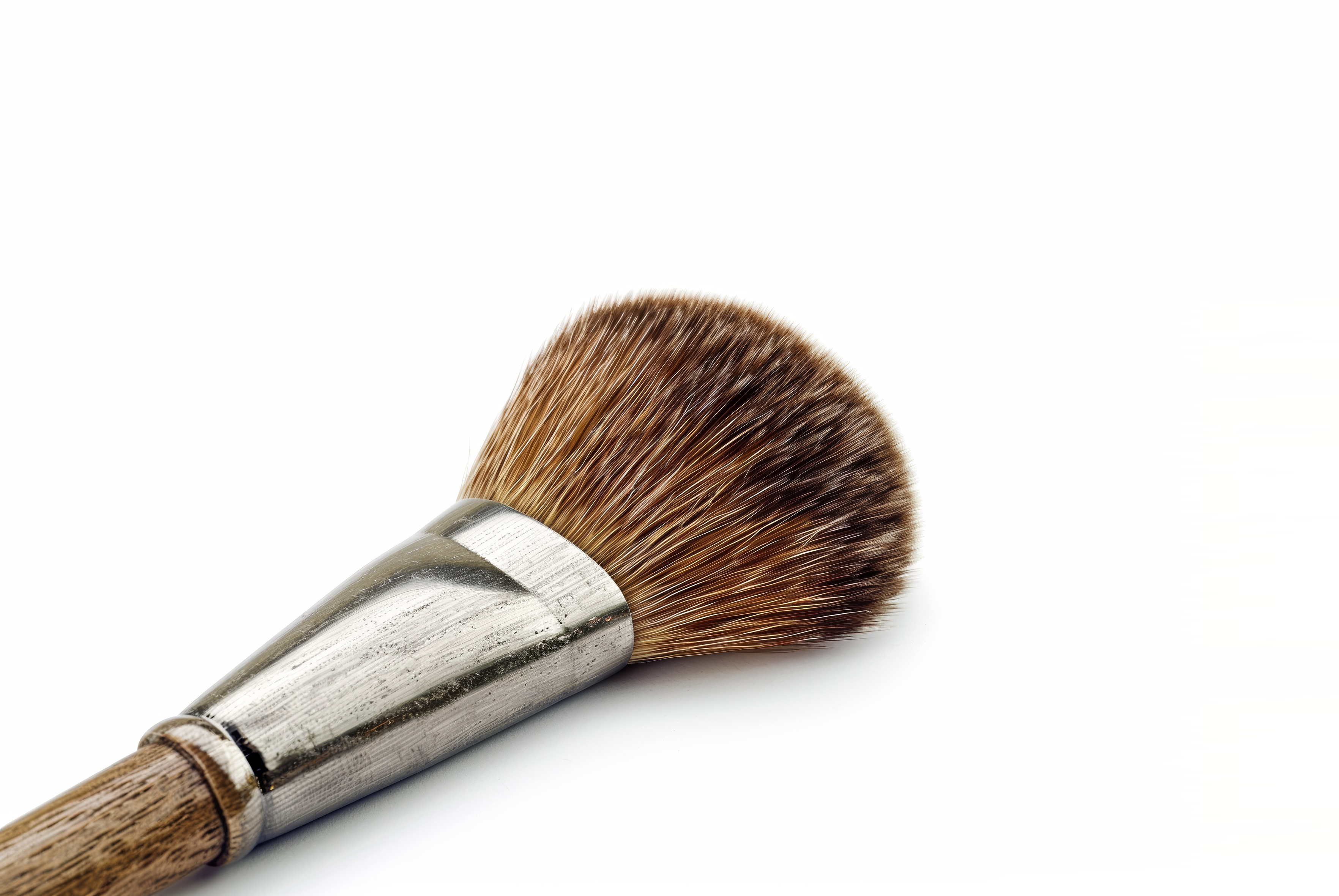 Wooden make up brush on white Background