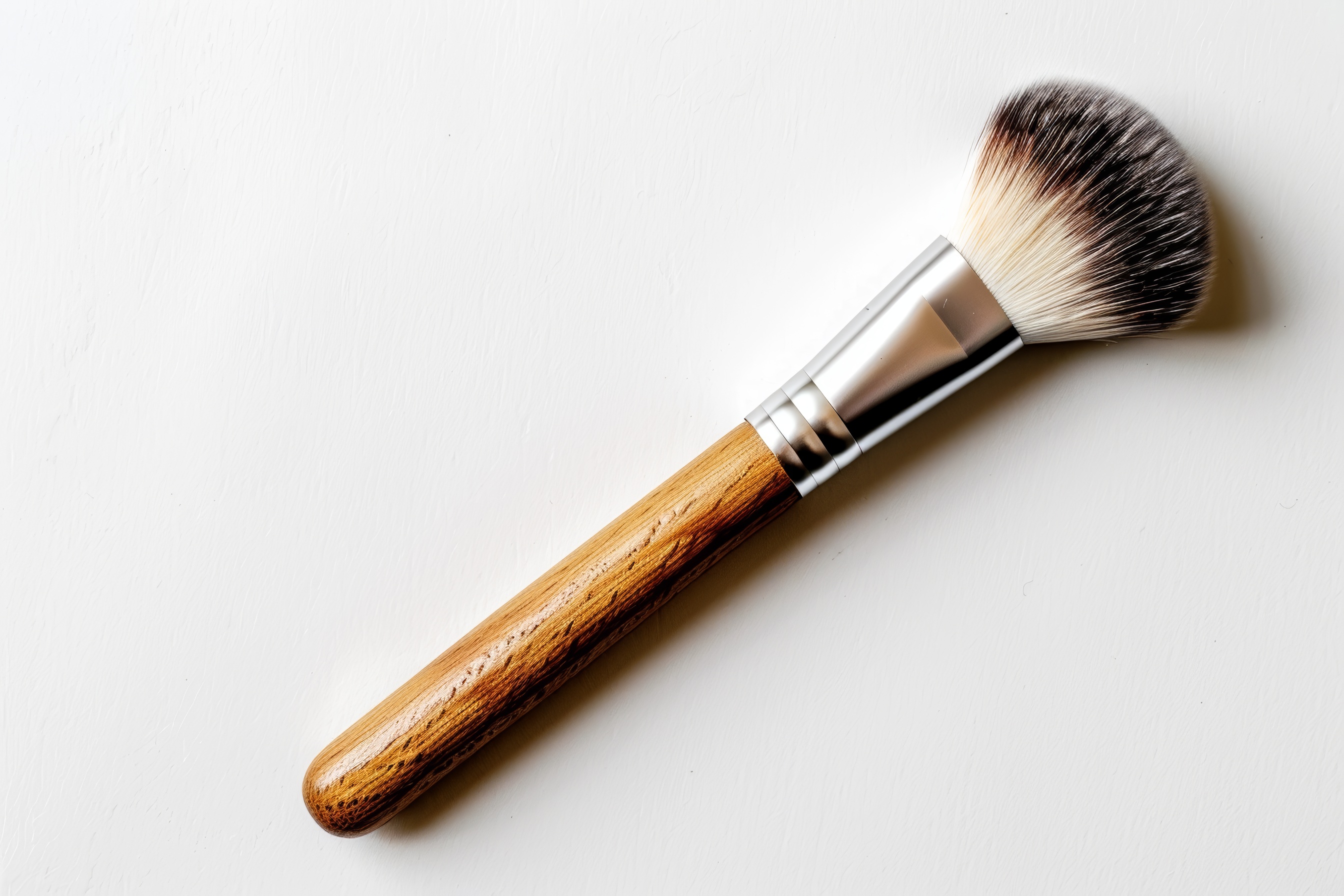 Wooden make up brush on white Background