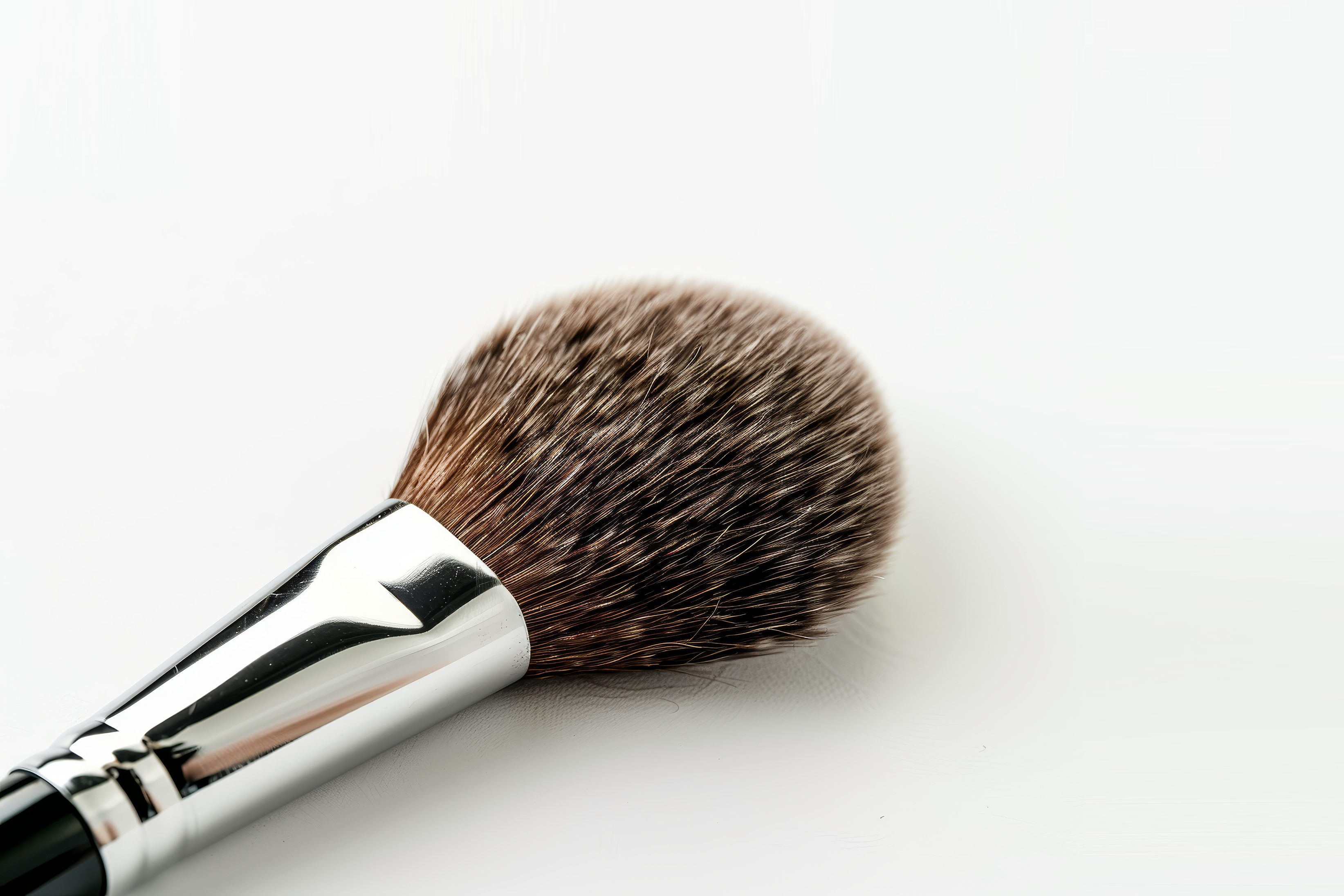 Wooden make up brush on white Background